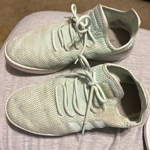 Adidas tennis shoes.